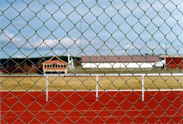 behind the fence