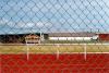 behind the fence